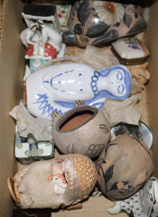 A box of assorted ceramics and curios